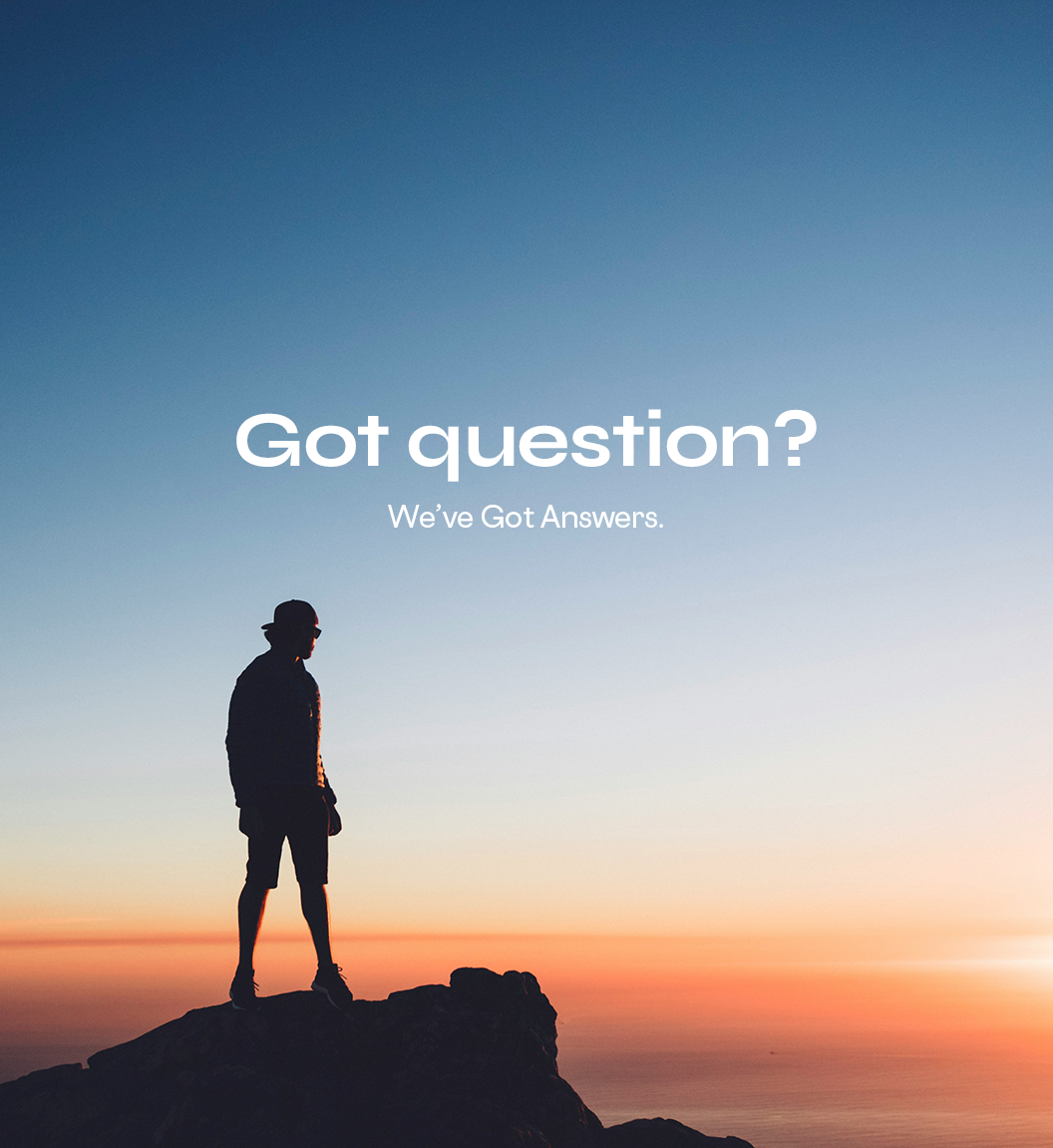 Person standing on a rock with a sunset background and text 'Got question? We've Got Answers.'