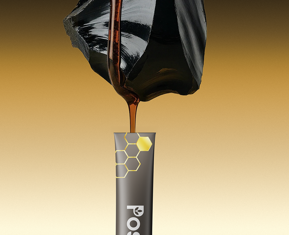 Black honeycomb stick with honey dripping from it against a gradient background