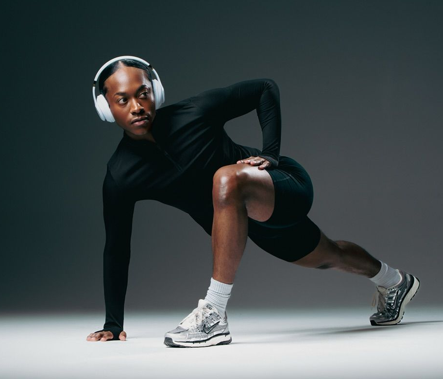 Athletic woman stretching in sportswear with “Relax Naturally, Live Fully!” motivational text promoting calmness, fitness, and healthy lifestyle.